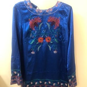 Royal blue satin dress with intricate embroidery.